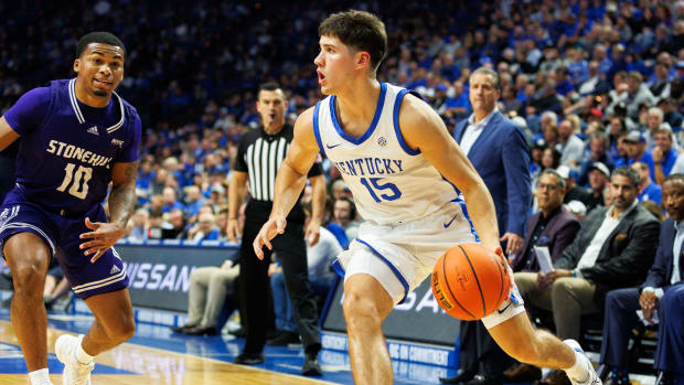 Nov 17, 2023; Lexington, Kentucky, USA; Kentucky Wildcats guard Reed Sheppard (15) drives to the basket during the second half against the Stonehill Skyhawks at Rupp Arena at Central Bank Center. Mandatory Credit: Jordan Prather-USA TODAY Sports